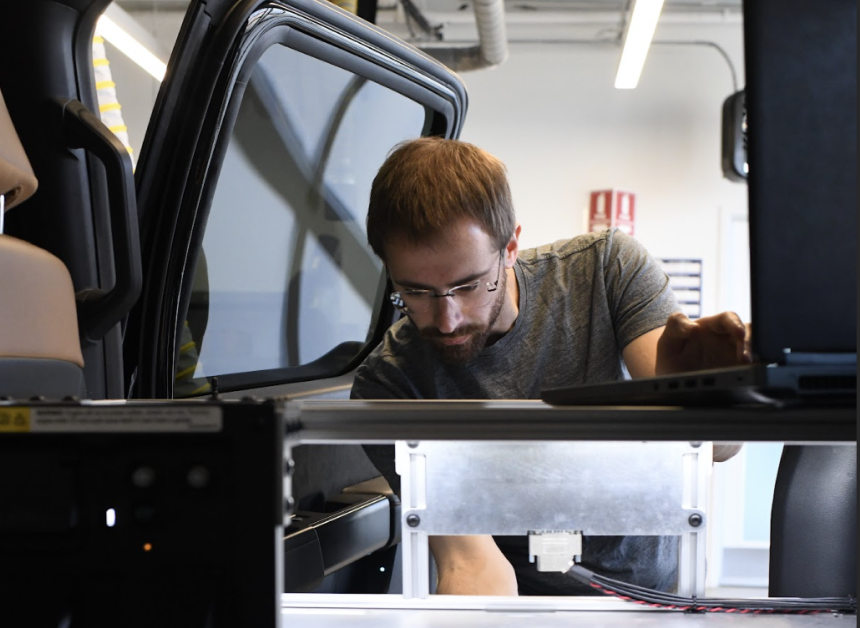 Man working in vehicle